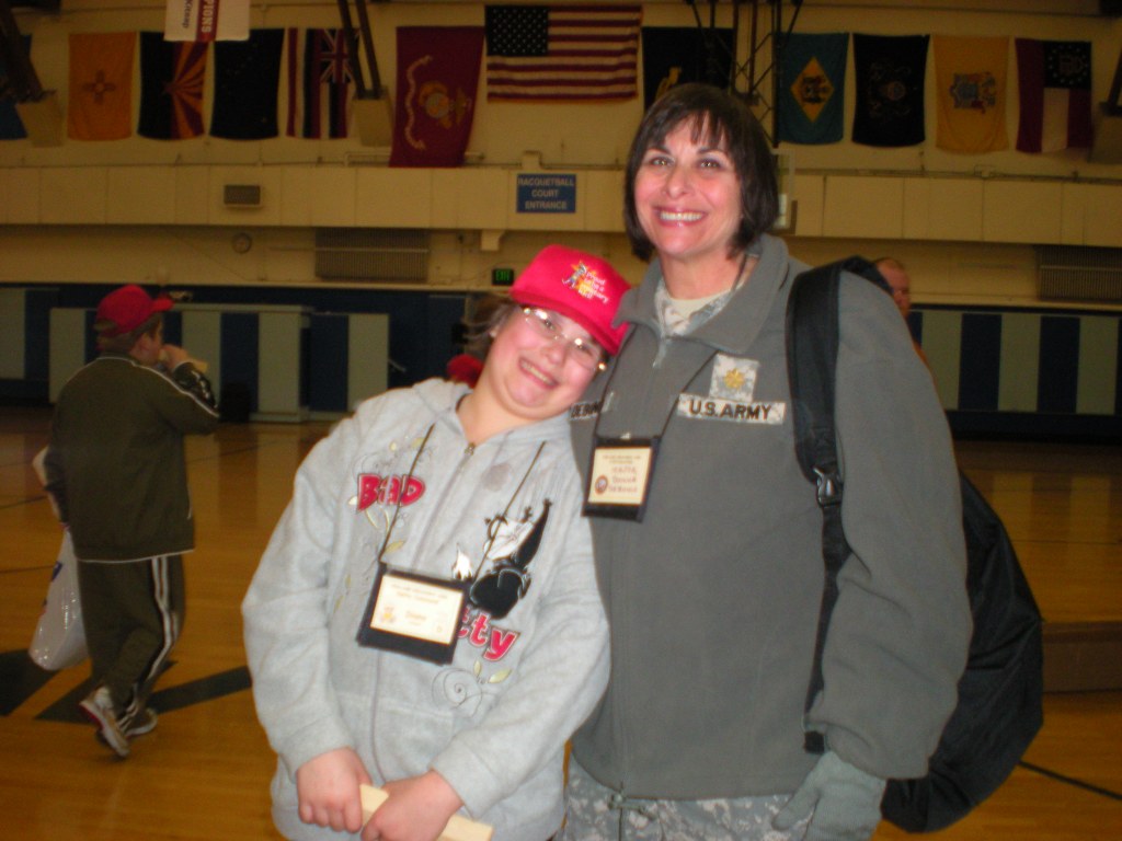 Donna DeBonis an Army Veterinarian pre-deployment with her little daughter.